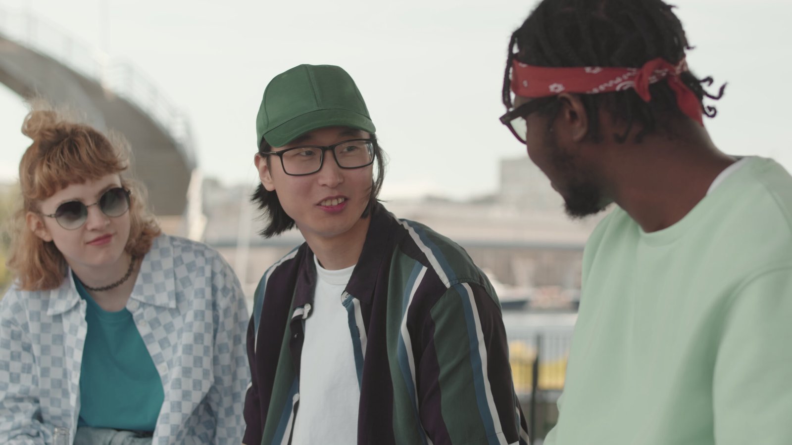 waist-up-slowmo-of-three-young-multiethnic-gen-z-hipster-friends-in-vintage-old-school-SBI-350655690